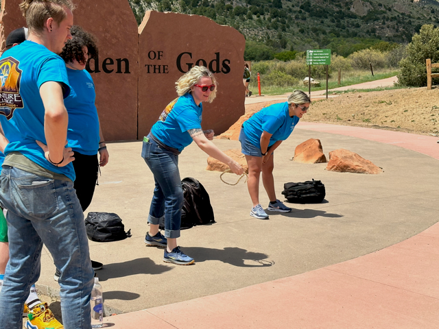 people playing a game at garden of the gods