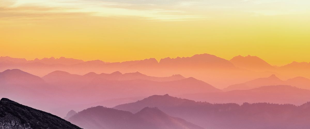 yellow and pink mountain background